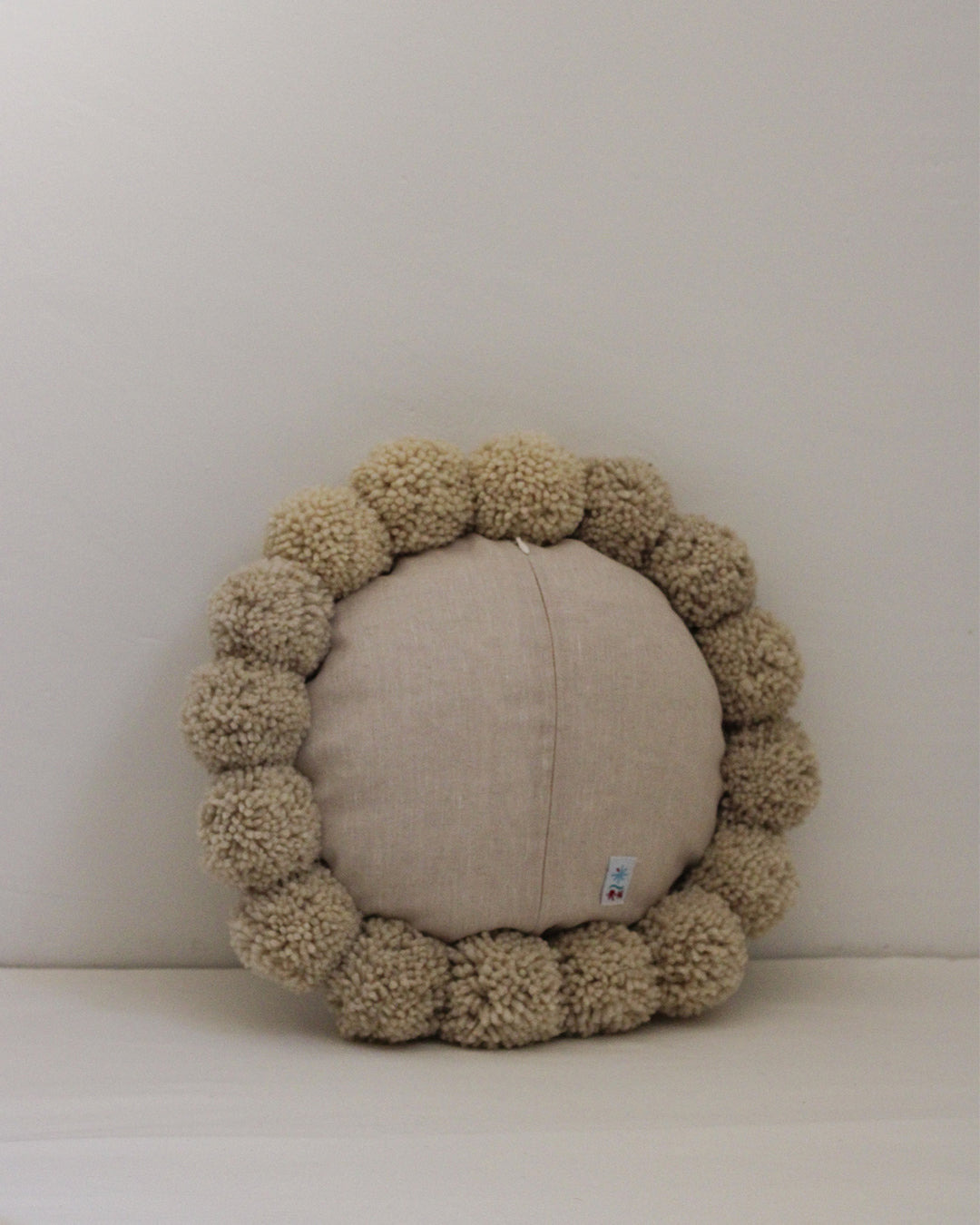 Cojín Pom Pom Circular